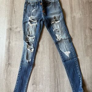 Distressed Blue Denim Jeans
